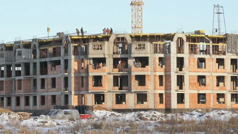 Construction of an apartment building in winter Stock Footage 103547572