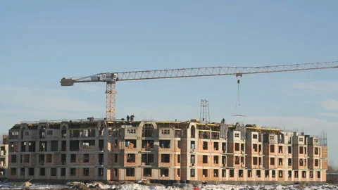 Construction of an apartment building in winter Stock Footage 316793935