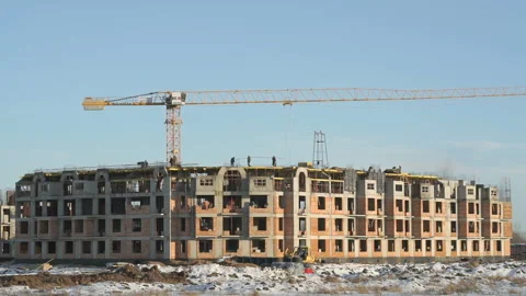 Construction of an apartment building in winter Stock Footage 316794480