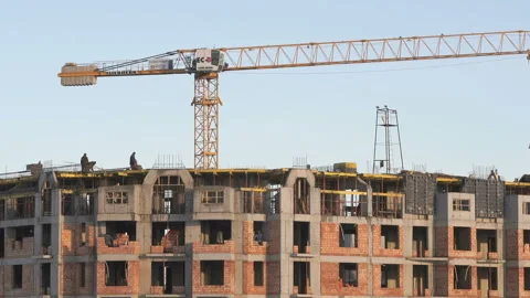 Construction of an apartment building in winter Stock Footage 316794613