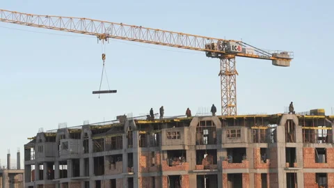 Construction of an apartment building in winter Stock Footage 316794650