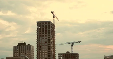 Construction area in city, cranes not working with sky and clouds on background. Stock Footage 211818054