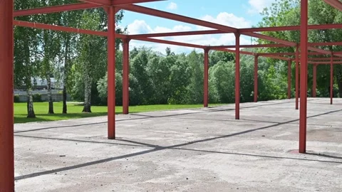 A construction area shows a steel frame structure in an open space. The setting Stock-Footage 339004641