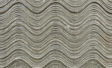 Construction asbestos-cement slate in a stack as background Stock Photos