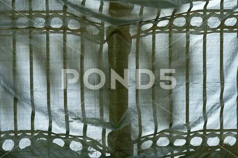 Construction awning on the decorative fence Stock Photos