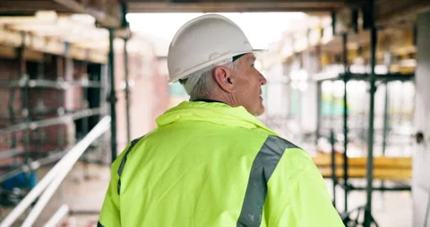 Construction, back or man on site with inspection, safety check or quality Stock Footage 337034471