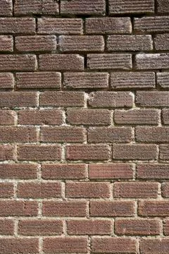 Construction background - an old brick wall needs re-pointing Stock Photos
