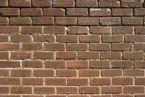Construction background - an old brick wall needs re-pointing Stock Photos