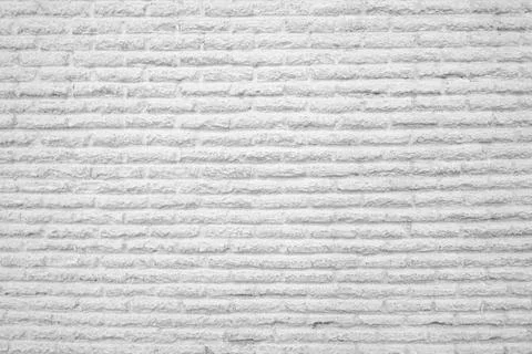 Construction background or brick wall backdrop of white abstract pattern. Stock Photos