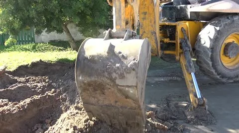 Construction, Backhoe Tractor On Construction Site Video stock 12653121