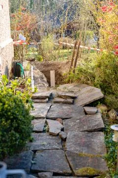 Construction barrier in front yard. Construction site of sewerage shaft. Foto stock