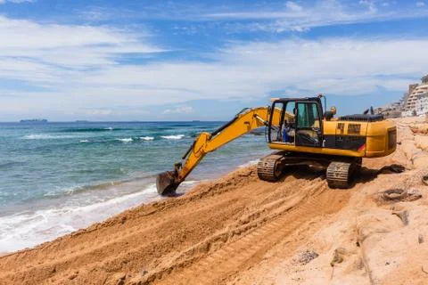 Construction Beach Ocean Erosion Repairs Excavator Machine Stock Photos
