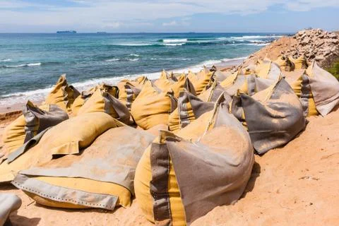 Construction Beach Ocean Erosion Storm Repairs Sandbags Stock Photos