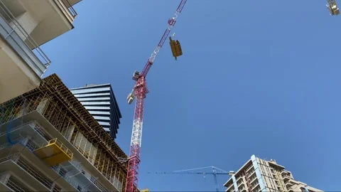 Construction of a beautiful modern office skyscraper against the sky. Stock Footage 243208936