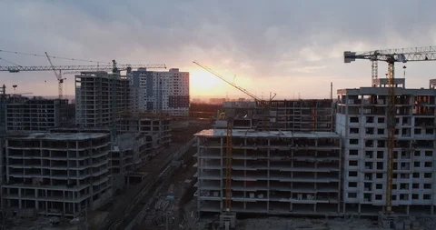 Construction of blocks, buildings in the city of a sunset. Stock Footage 127283712