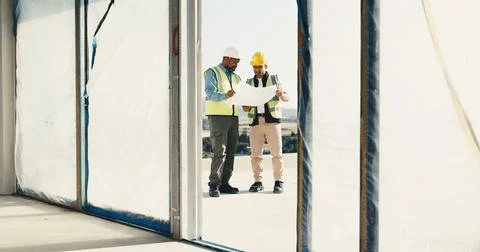Construction, blueprint and men in building for planning, discussion and Stock Photos
