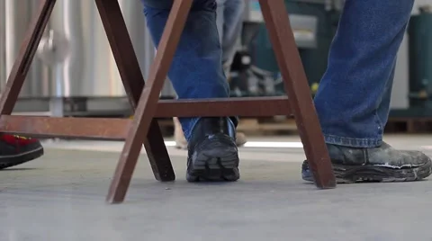Construction boots after some work Stock Footage 61390075