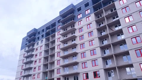 Construction of a brick apartment building. Construction building. Stock Footage 345686222