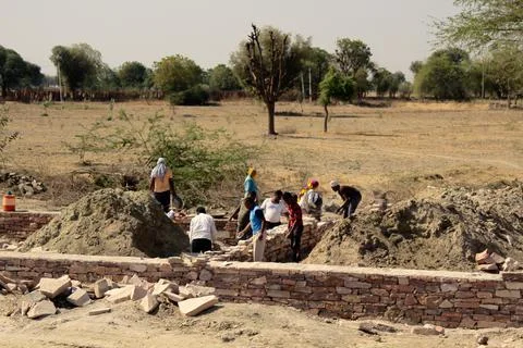 Construction of a brick building by Indian builders almost only hands Fotos de archivo