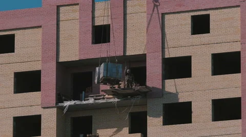 Construction of a brick high-rise building Stock Footage 61909064