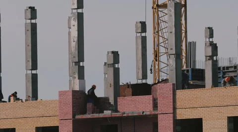 Construction of a brick high-rise building Stock-Footage 61909578