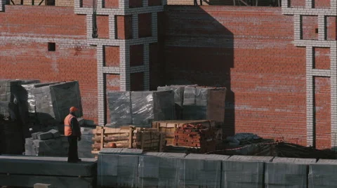 Construction of a brick high-rise building Stock Footage 61909678