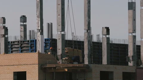 Construction of a brick high-rise building Stock Footage 61909884