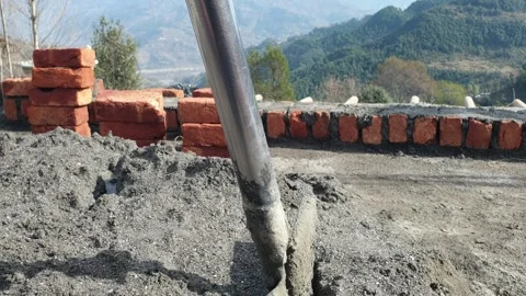 Construction of brick house in rural area Stock-Footage 256773491