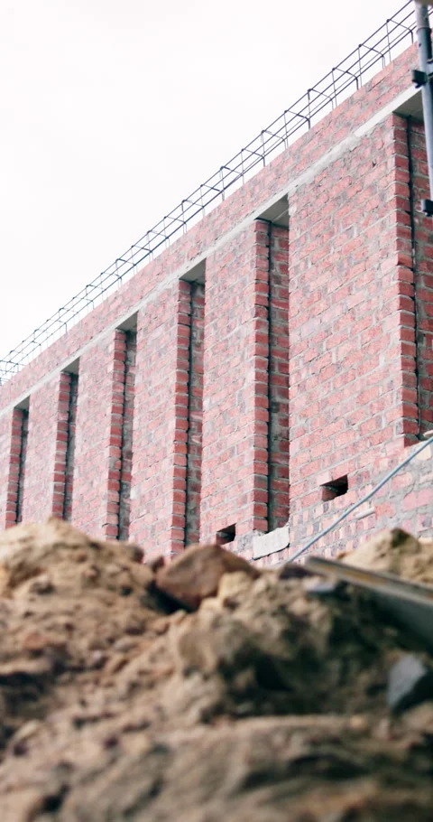 Construction, brick wall or empty site for building progress, excavation phase Stock Footage 340900491