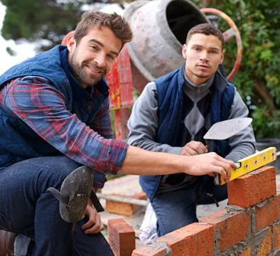 Construction, bricklayer and working with teamwork tools, maintenance employee Stock Photos