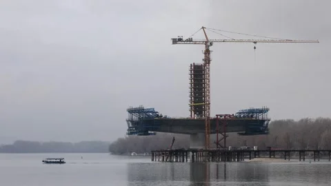 Construction of bridge across Danube Video stock 328003604