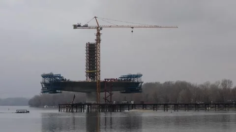 Construction of bridge across Danube Video stock 328003618