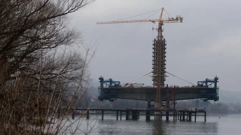 Construction of bridge across Danube Video stock 328003633