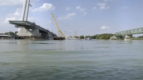 Construction of a bridge over the Danube Stock Footage 116192908