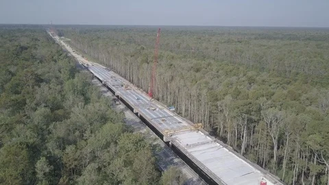Construction bridge replacement large crane fly by - 4K Video stock 110924774