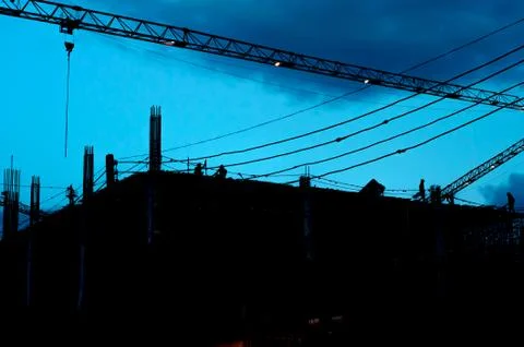Construction building and crane Stock Photos