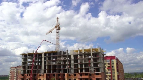 Construction of the building on the background of sky and clouds time lapse. 4 k Stock Footage 84919942
