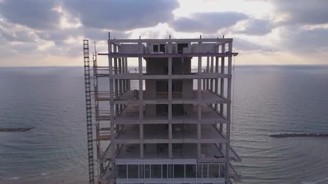 Construction building with beach and sunset Vídeo Stock 86038868
