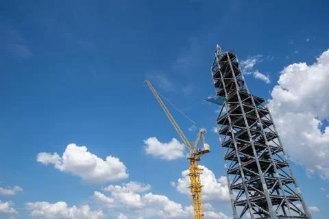 Construction of building a beautiful sky background. Steel Structures. Constr Stock Photos