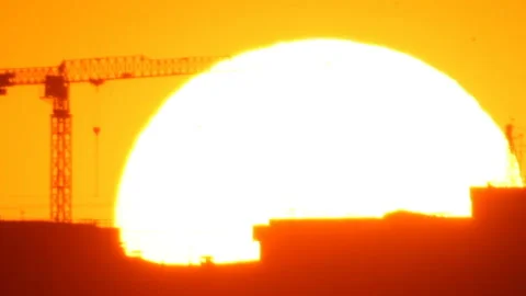 Construction of building in big sunset Stock Footage 123700076