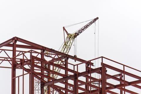 The construction of the building. Builder welding metal Stock Photos