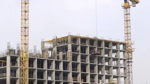 Construction of a building with construction cranes. Stock-Footage 166033112
