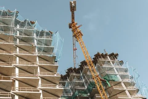 Construction of a building. Construction site with crane. Business, develop.. Foto stock