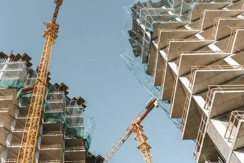 Construction of a building. Construction site with crane. Business, develop.. Stock Photos
