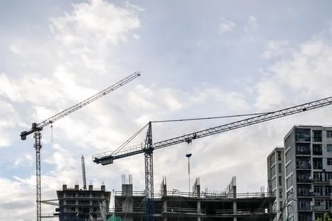 Construction of a building. Construction site with crane. Business, development 写真素材