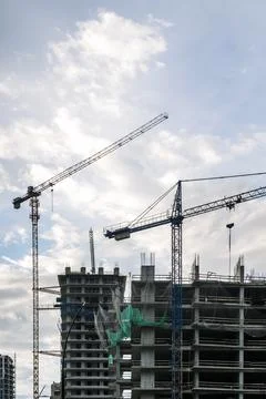 Construction of a building. Construction site with crane. Business, development Stock Photos