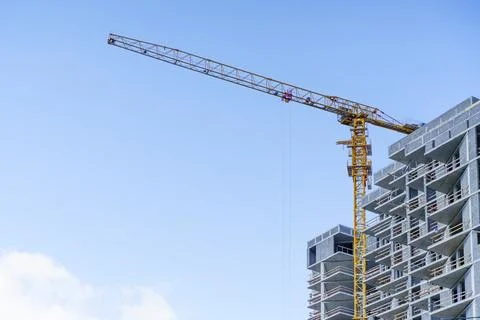 Construction of a building. Construction site with crane. Business, development Stock Photos