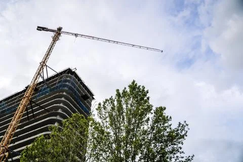 Construction of a building. Construction site with crane. Business, development Stock Photos