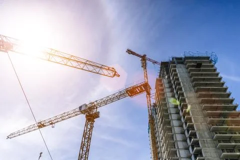 Construction of a building. Construction site with crane. Business, development 写真素材
