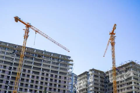 Construction of a building. Construction site with crane. Business, development 写真素材
